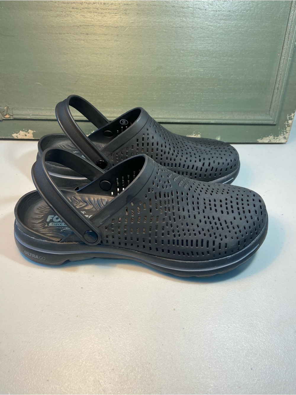 Skechers Men’s Perforated Black Foam Clogs with Pivoting Heel Strap